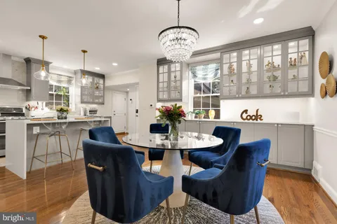 a kitchen with stainless steel appliances a stove and a refrigerator