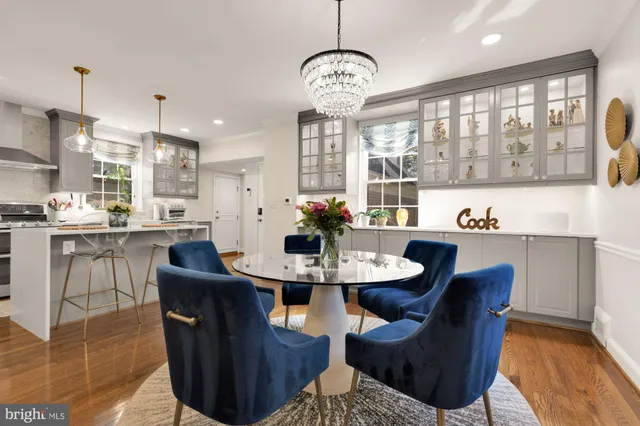 a kitchen with stainless steel appliances a stove and a refrigerator