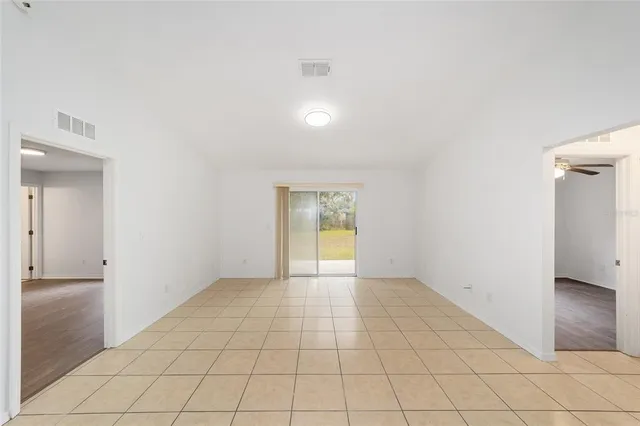 a view of an empty room and window