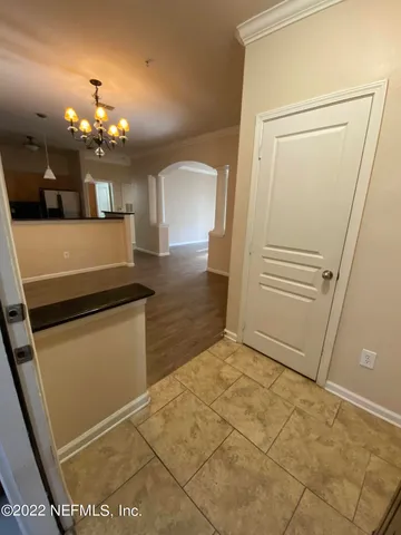 a view of a kitchen with a sink and dishwasher
