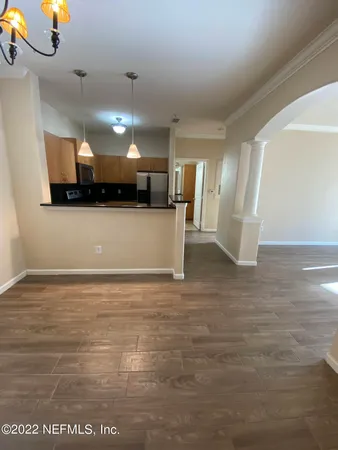 a view of a kitchen with a sink