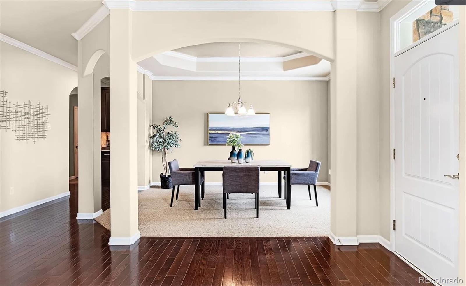 27235 East Lakeview Place Aurora, CO 80016 - Photo 4 of 22 a view of a dining room with furniture and wooden floor