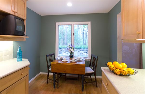 6 Steepletree Lane, Unit 6 Wayland, MA 01778 - Photo 12 of 16 a dining room with furniture and a window