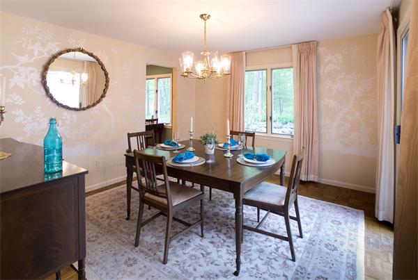 6 Steepletree Lane, Unit 6 Wayland, MA 01778 - Photo 3 of 16 a view of a dining room with furniture a chandelier and wooden floor