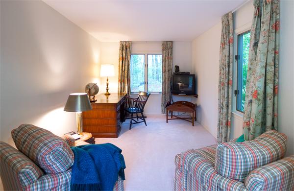 6 Steepletree Lane, Unit 6 Wayland, MA 01778 - Photo 5 of 16 a living room with furniture and a large window