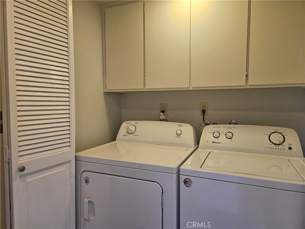 3155 Ramon Road, Unit 601 Palm Springs, CA 92264 - Photo 13 of 35 a utility room with dryer and washer