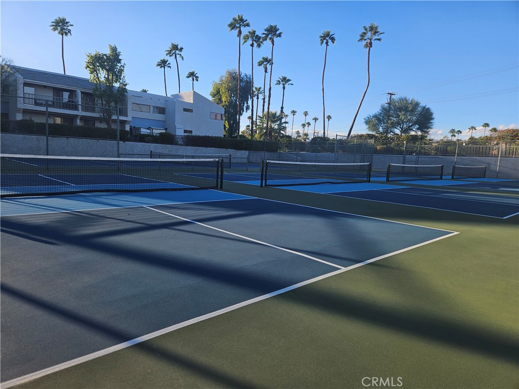 3155 Ramon Road, Unit 601 Palm Springs, CA 92264 - Photo 16 of 35 a view of a tennis court