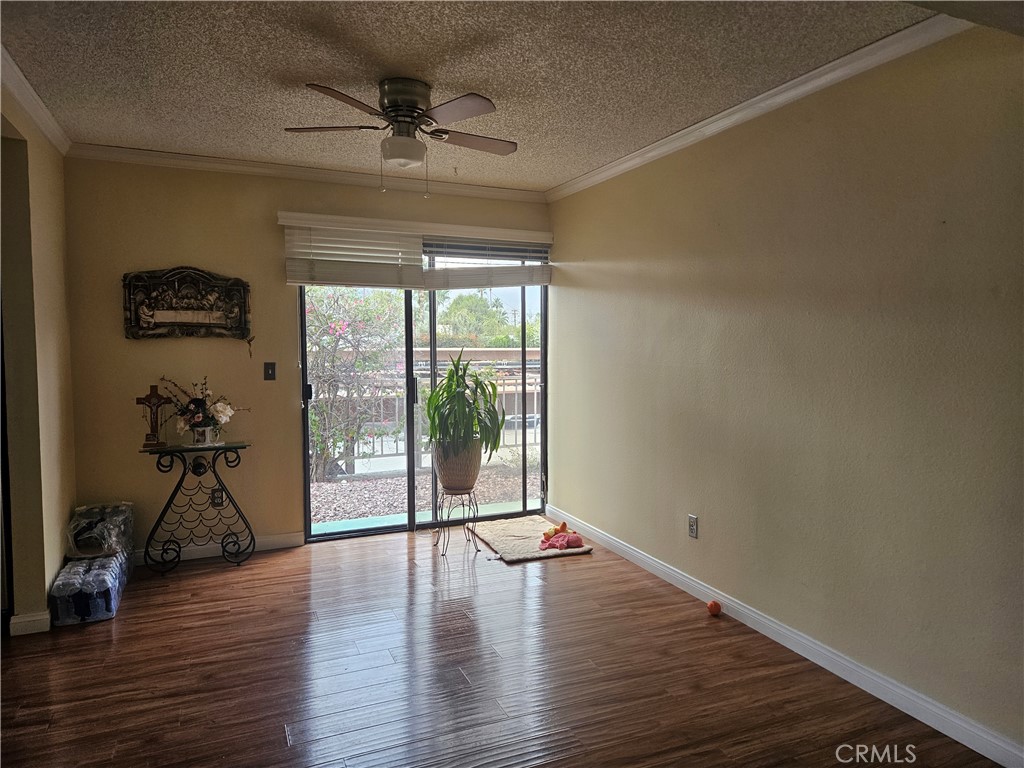 3155 Ramon Road, Unit 601 Palm Springs, CA 92264 - Photo 34 of 35 a view of empty room with wooden floor and fan