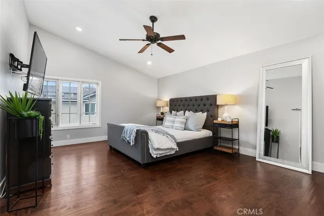 a bathroom with a sink a toilet and a shower