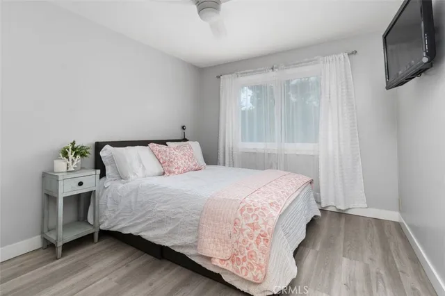 a bathroom with a granite countertop sink mirror and shower