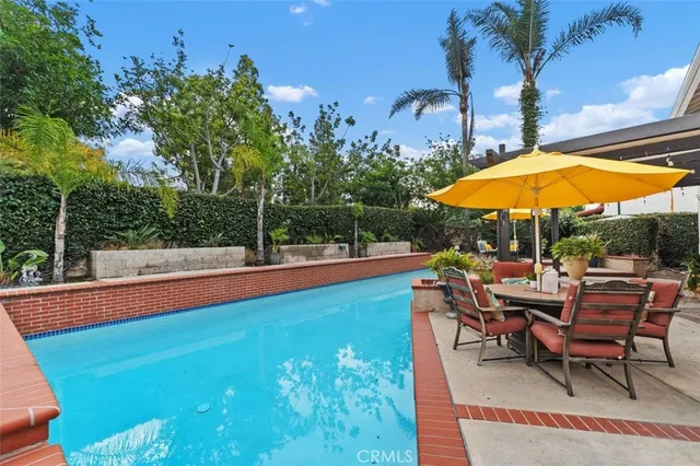 a view of a lake with outdoor seating