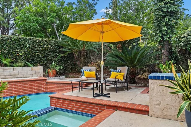 a view of outdoor space with garden and trees