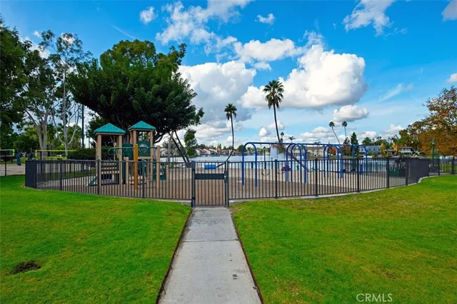 a view of a swimming pool with a lounge chair
