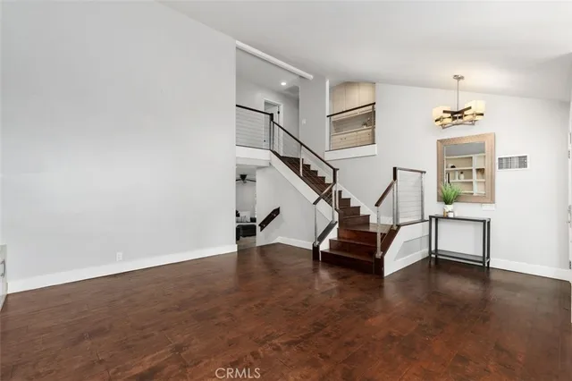 a view of livingroom with furniture and stairs