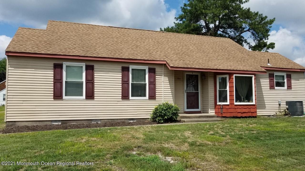 16 D Ashley Road Whiting, NJ 08759 - Photo 1 of 15 a front view of a house with a yard