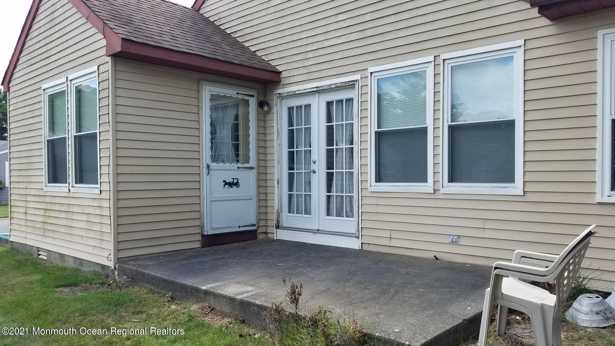 16 D Ashley Road Whiting, NJ 08759 - Photo 13 of 15 a view of a house with backyard and windows