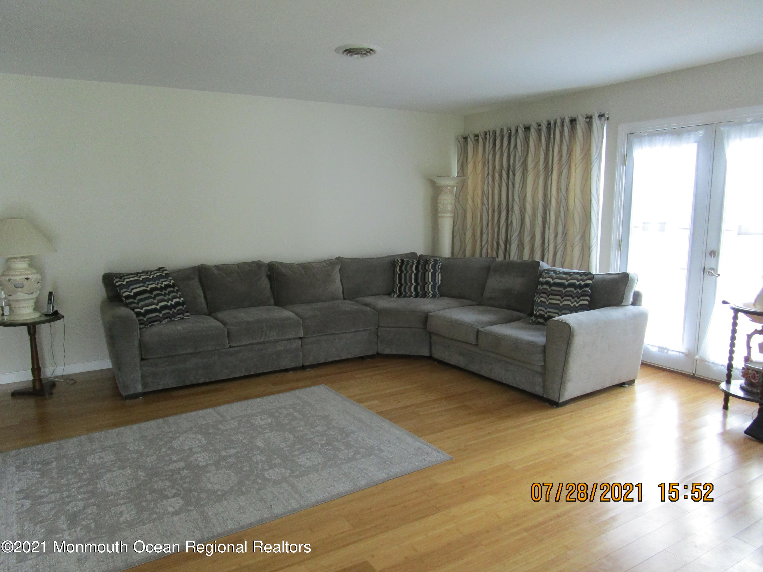 16 D Ashley Road Whiting, NJ 08759 - Photo 3 of 15 a living room with furniture and a couch