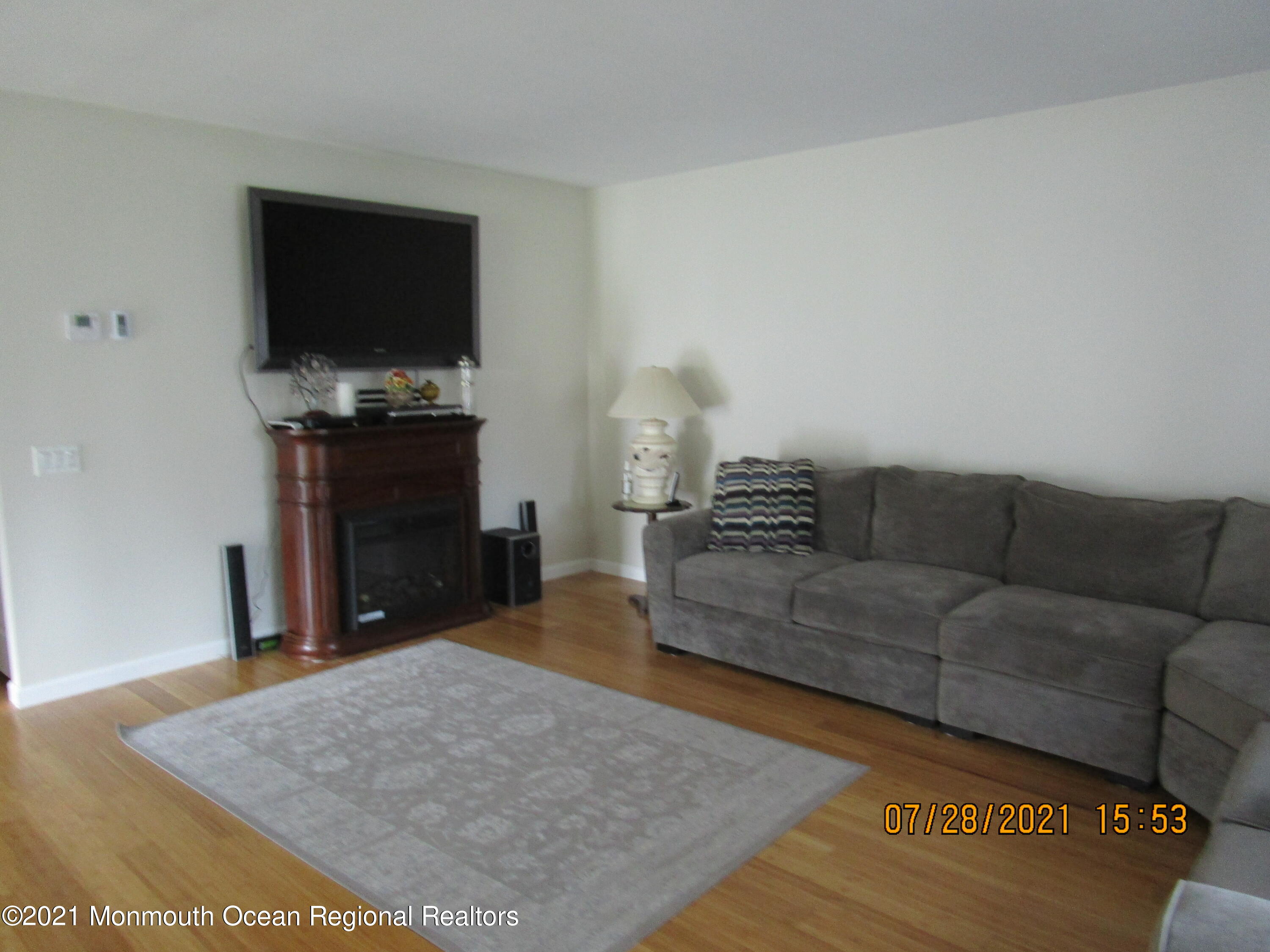16 D Ashley Road Whiting, NJ 08759 - Photo 4 of 15 a living room with furniture and a flat screen tv
