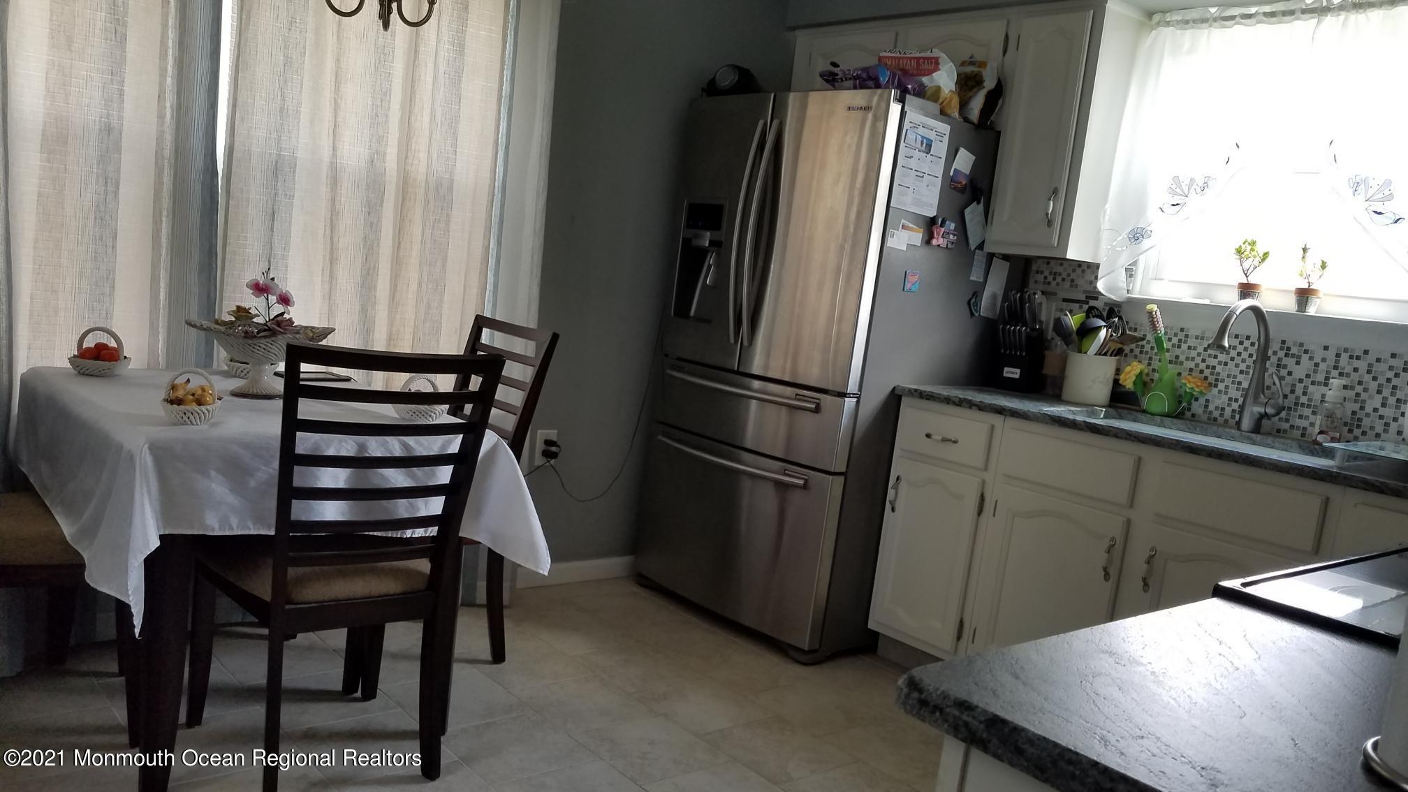 16 D Ashley Road Whiting, NJ 08759 - Photo 5 of 15 a view of a dining room with furniture and a window