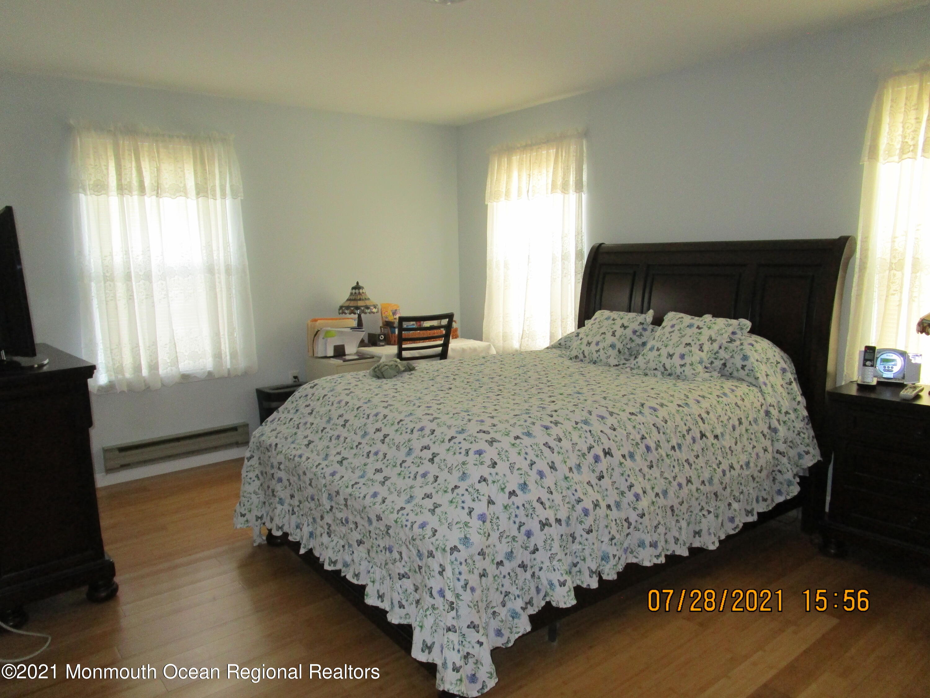 16 D Ashley Road Whiting, NJ 08759 - Photo 8 of 15 a bedroom with bed and window