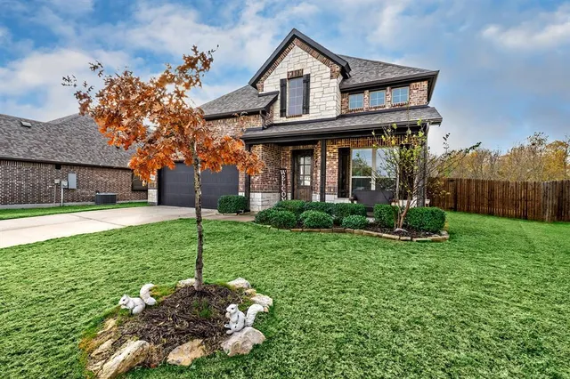 a view of a house with a yard porch and sitting area