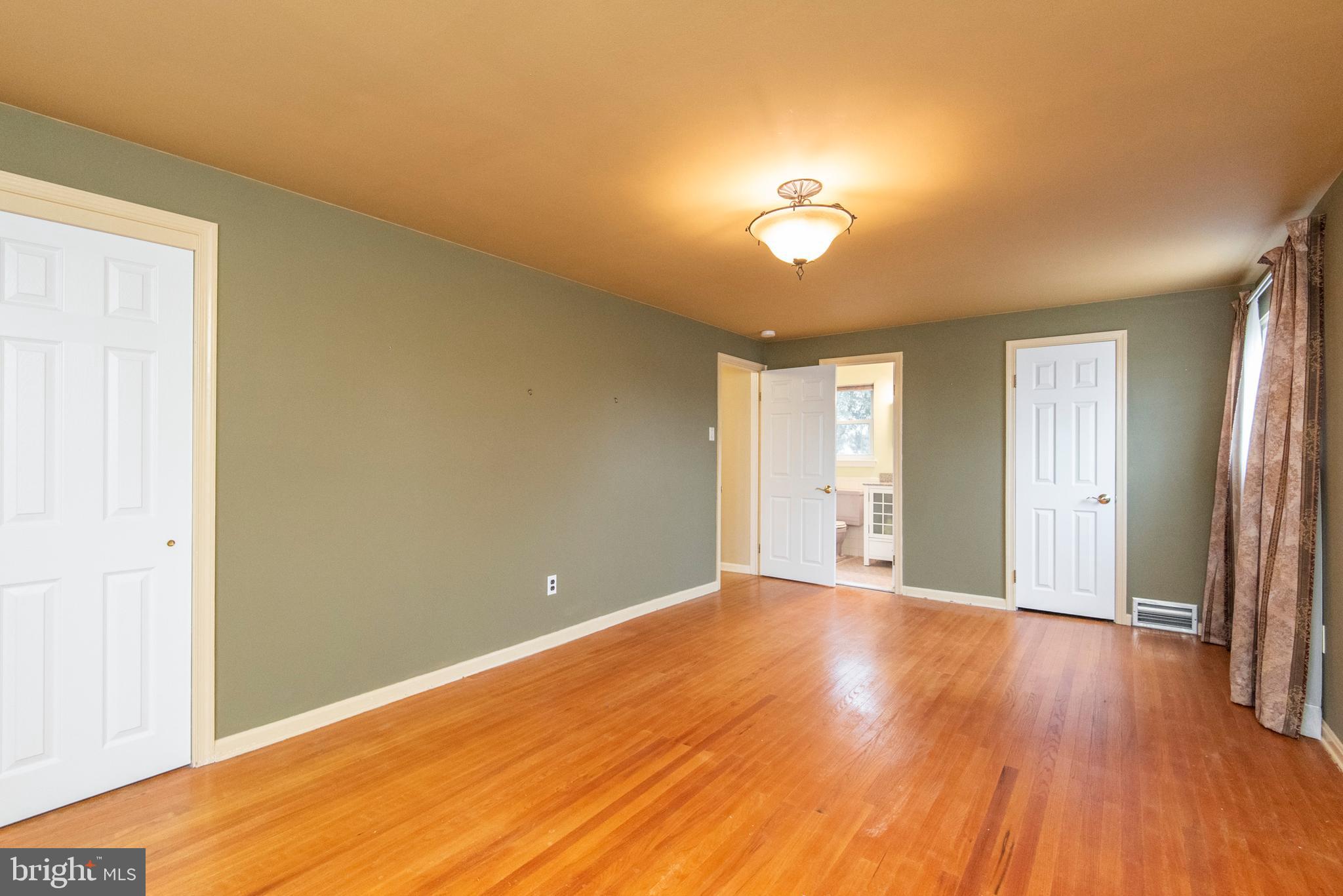 654 Barry Drive Springfield, PA 19064 - Photo 18 of 26 Master Bedroom leading to Full Bath