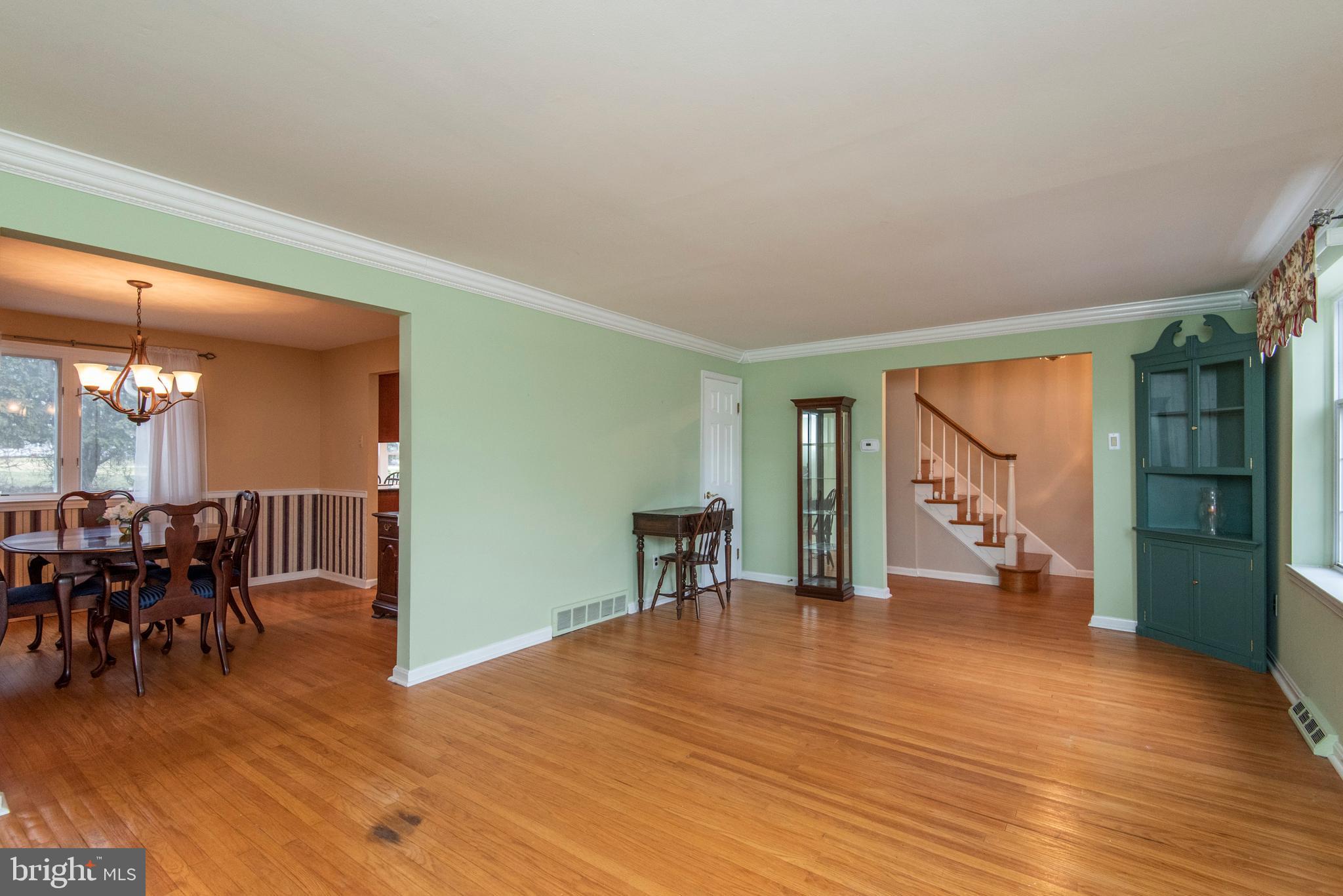 654 Barry Drive Springfield, PA 19064 - Photo 5 of 26 Living Room into Foyer and Dining Room