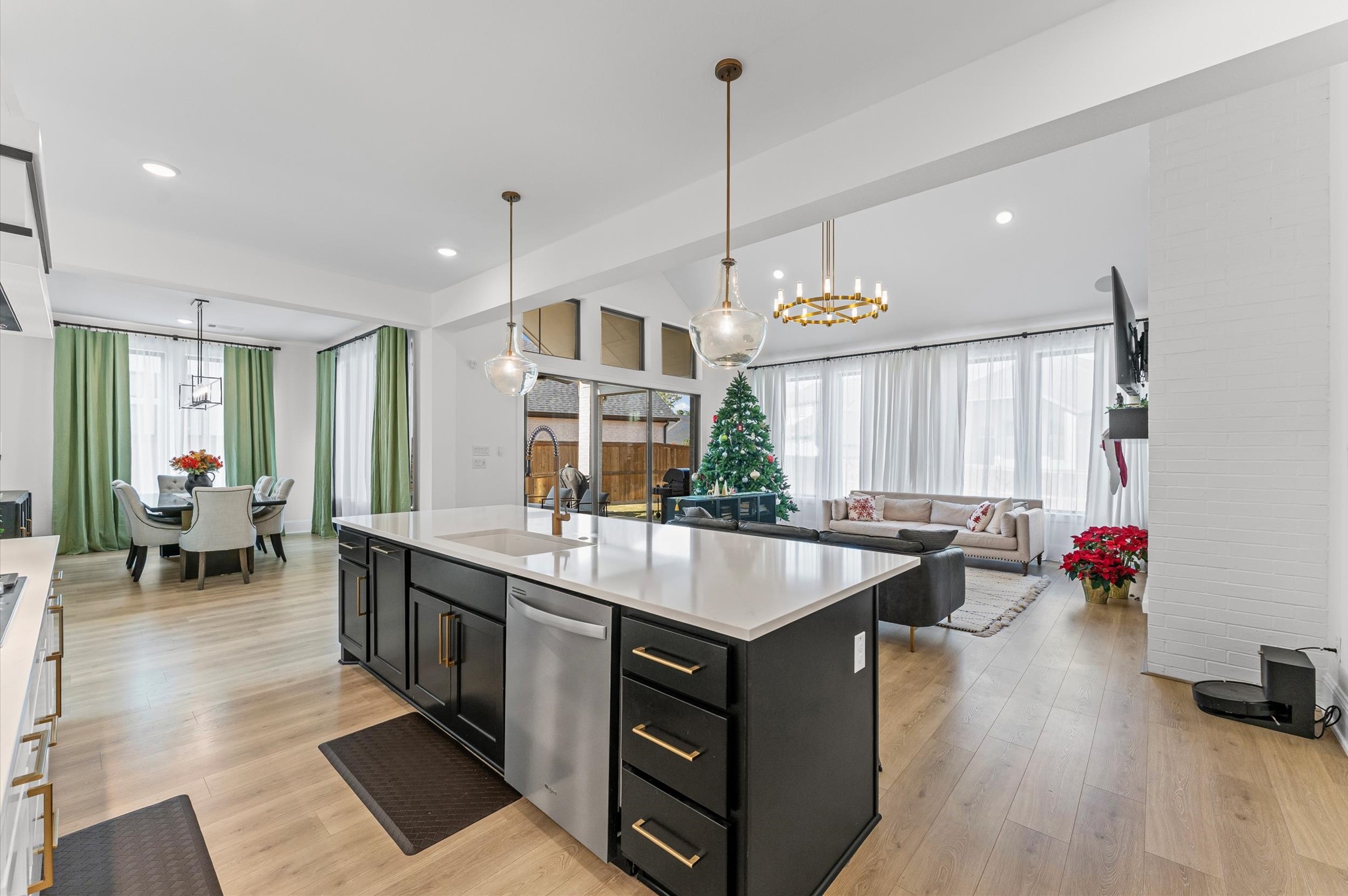 15470 Ringbill Way Magnolia, TX 77354 - Photo 15 of 50 a kitchen island with granite countertop a stove and a table