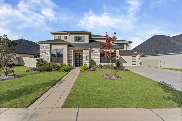 a house view with a garden space