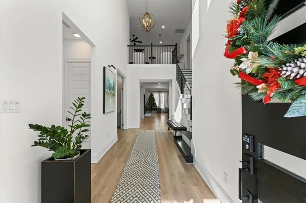a hallway with flowers in it
