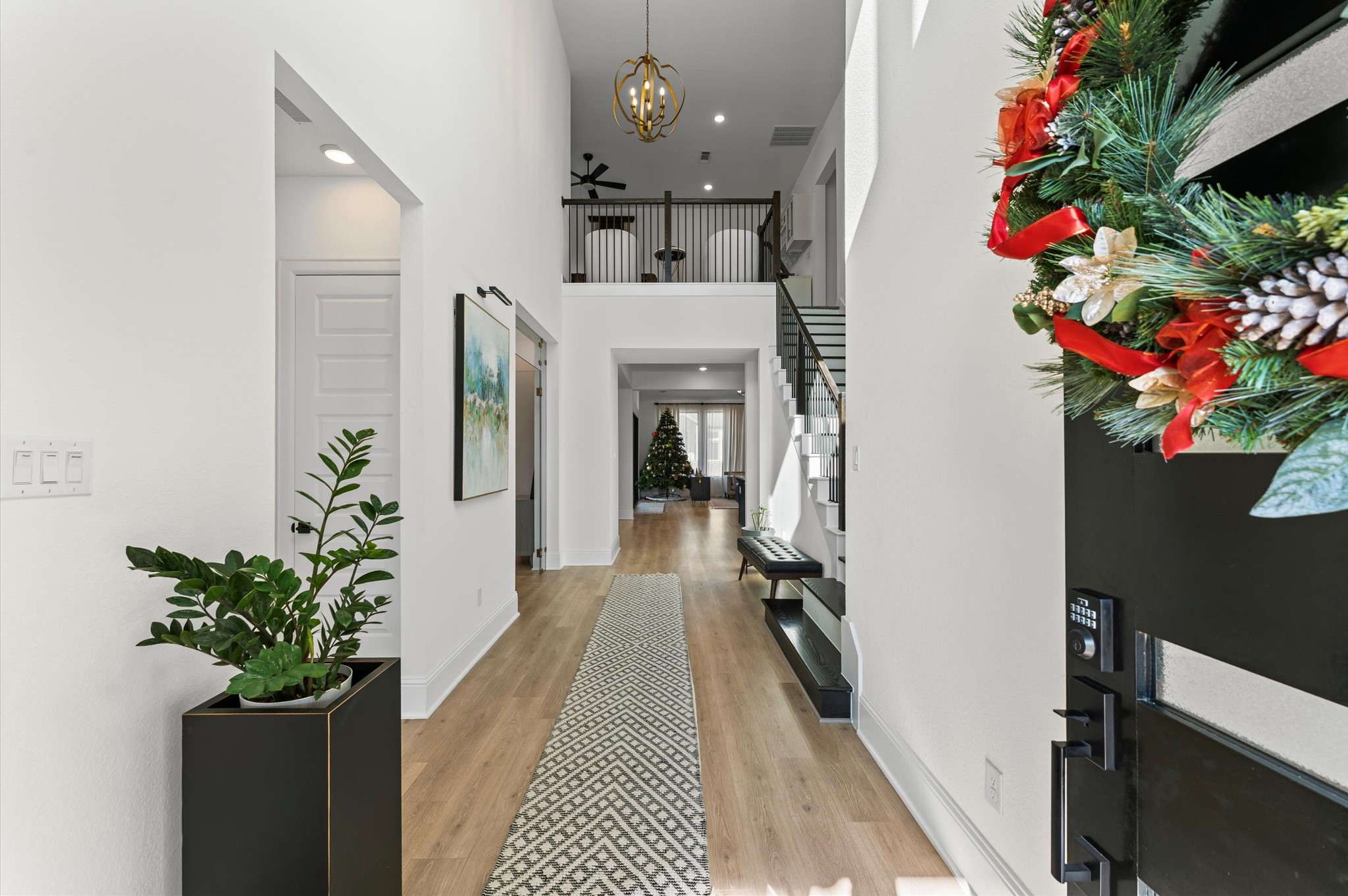 15470 Ringbill Way Magnolia, TX 77354 - Photo 26 of 50 a hallway with flowers in it
