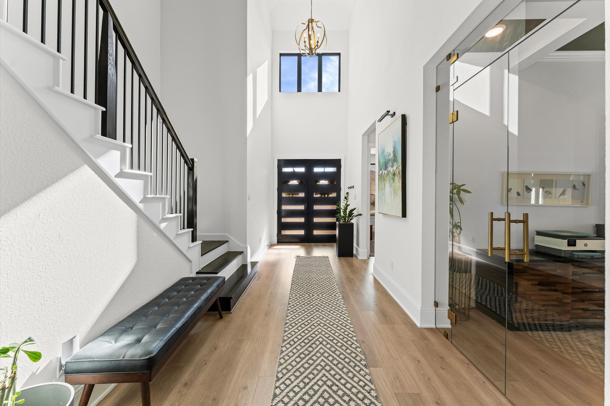 15470 Ringbill Way Magnolia, TX 77354 - Photo 27 of 50 a view of a hallway with wooden floor and staircase