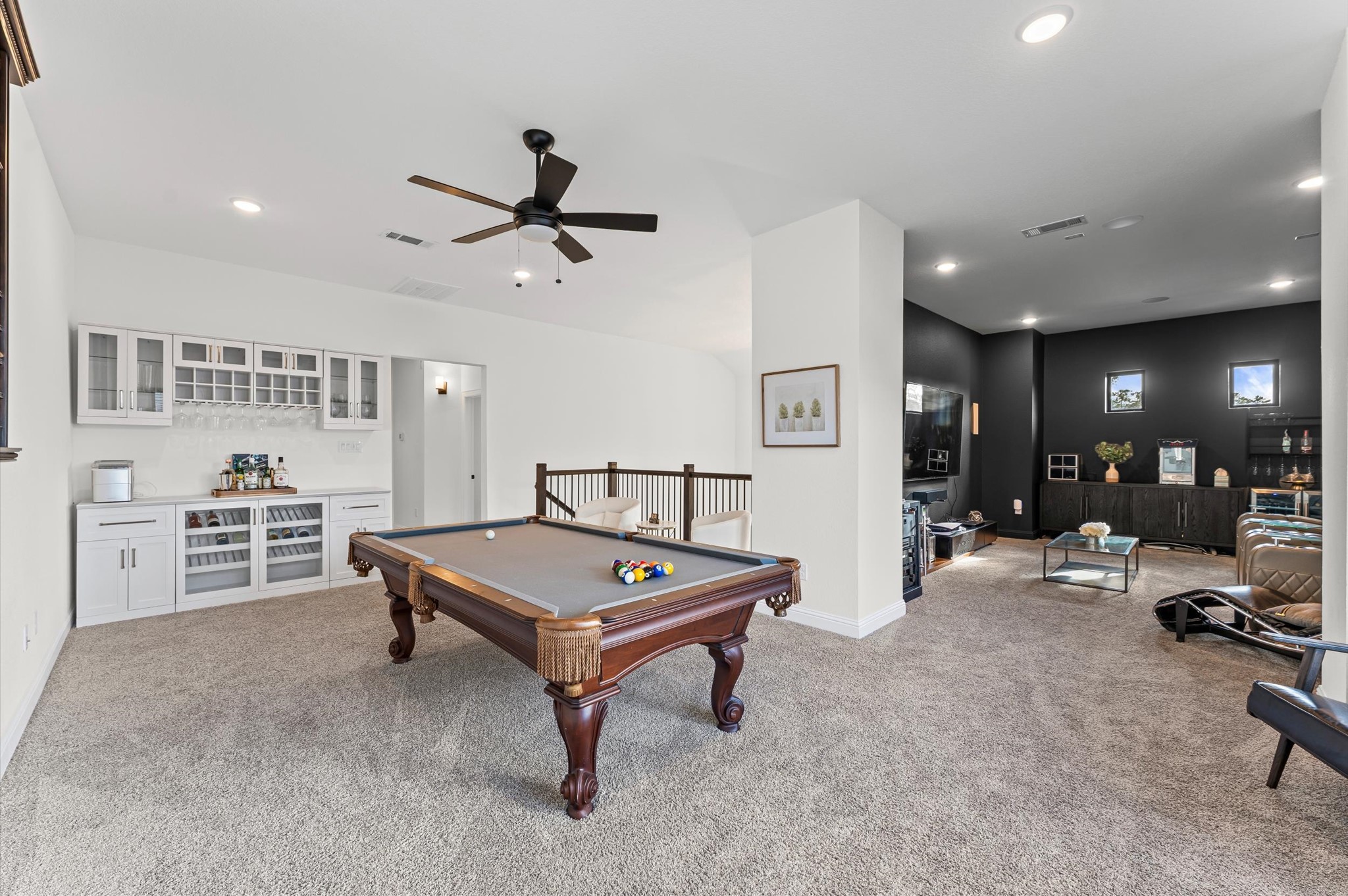 15470 Ringbill Way Magnolia, TX 77354 - Photo 31 of 50 a living room with furniture a table and gym equipment
