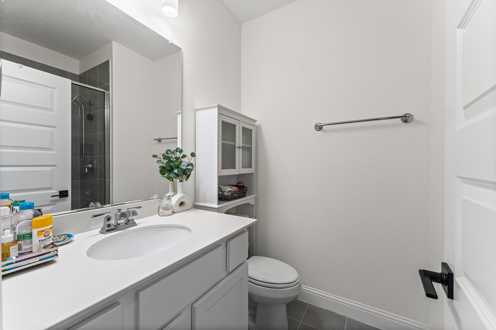 15470 Ringbill Way Magnolia, TX 77354 - Photo 35 of 50 a bathroom with a sink toilet and a mirror