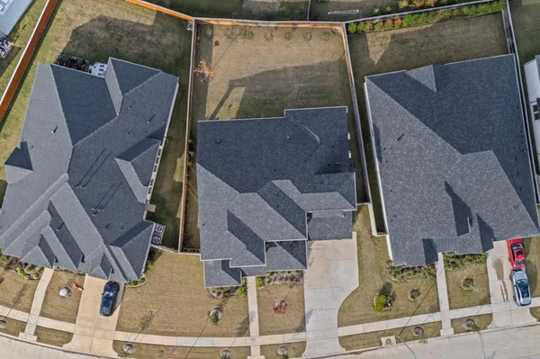 an aerial view of a house with a garden