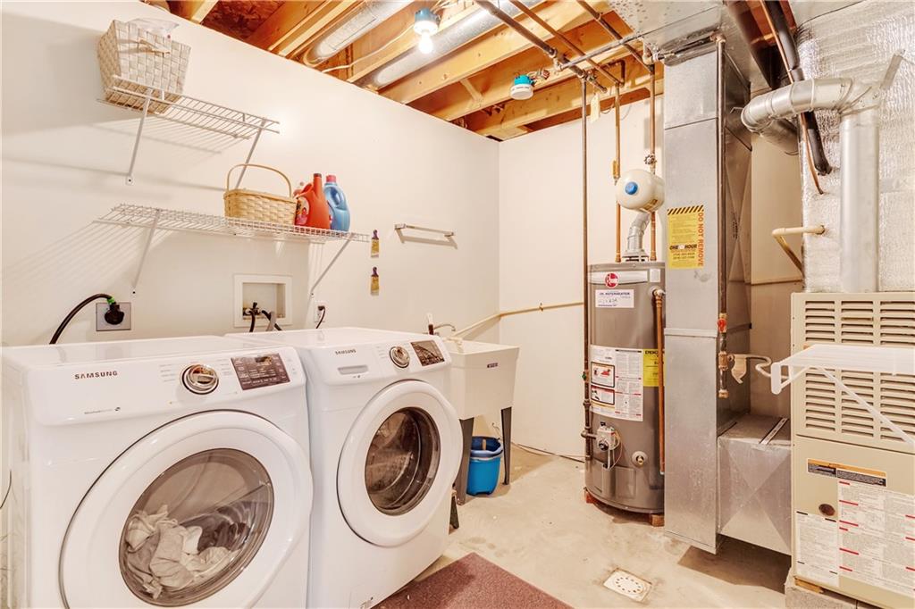 589 Slippery Rock Road Slippery Rock, PA 16057 - Photo 22 of 25 Basement laundry and mechanicals.
