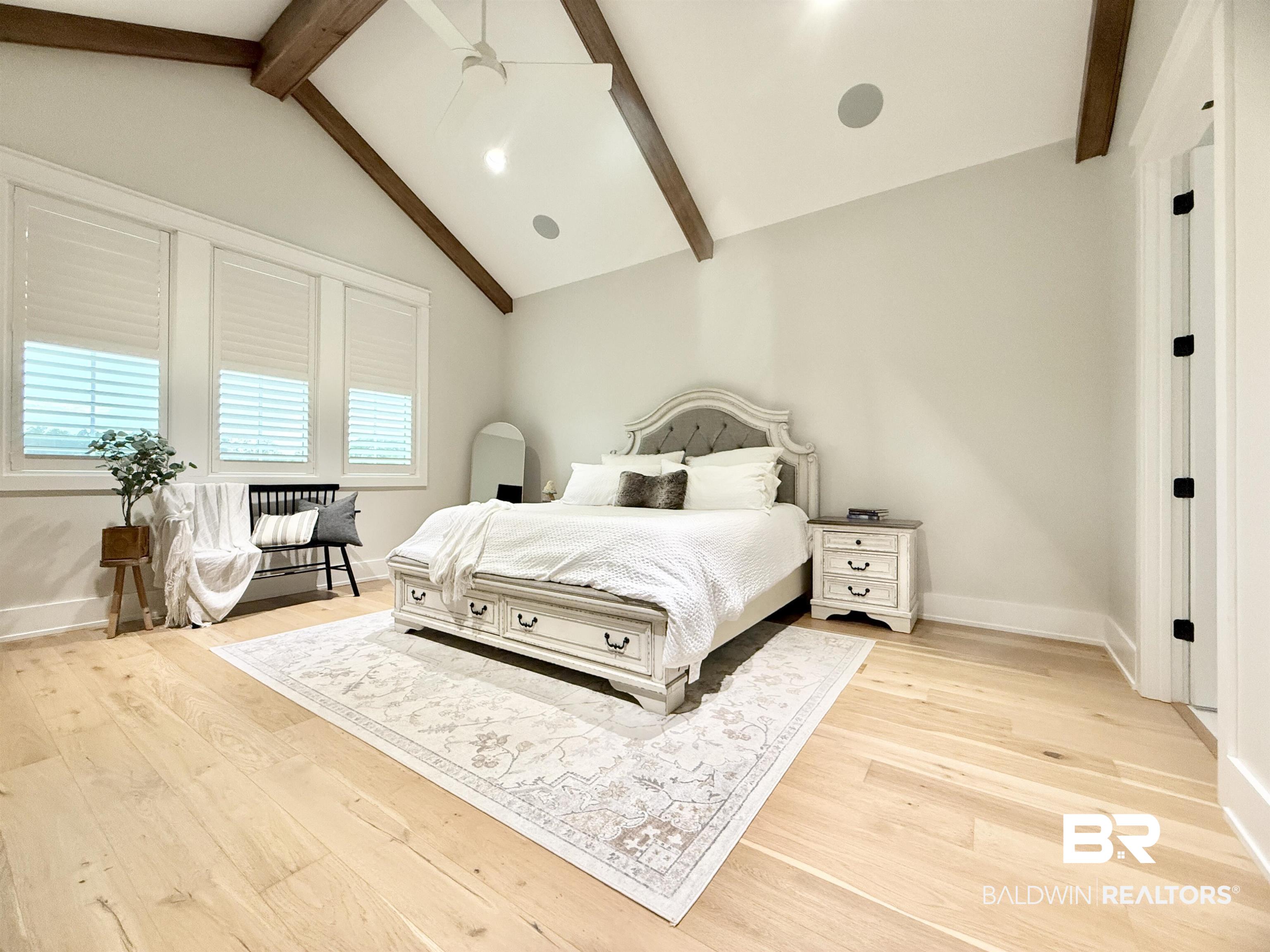 21767 Gallery Boulevard Fairhope, AL 36532 - Photo 27 of 74 Bedroom with light wood finished floors and baseboards