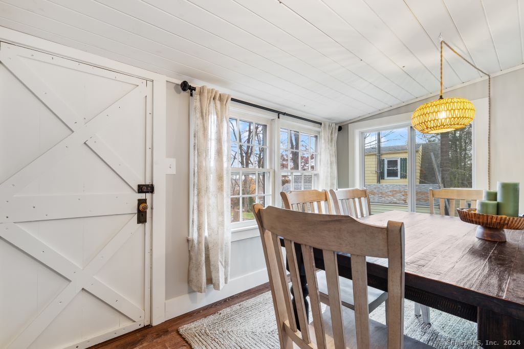 5 Old Clark Hill Road East Hampton, CT 06424 - Photo 13 of 20 a view of a dining room with furniture window and wooden floor