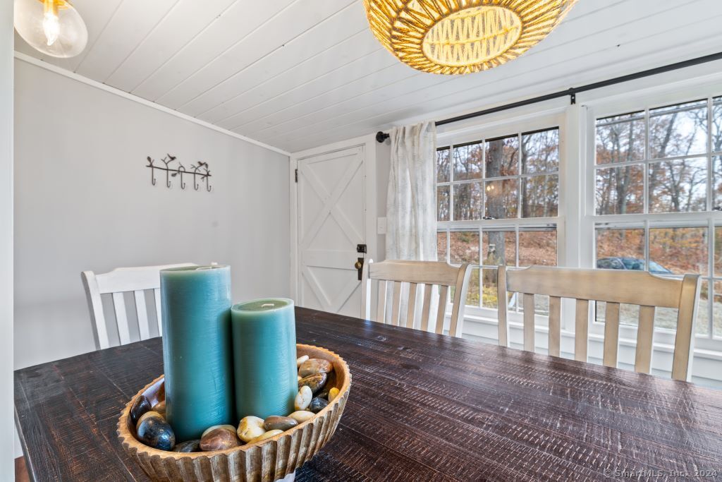 5 Old Clark Hill Road East Hampton, CT 06424 - Photo 15 of 20 a view of a dining room with furniture window and wooden floor