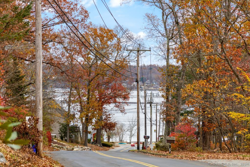 5 Old Clark Hill Road East Hampton, CT 06424 - Photo 20 of 20 a city street lined with buildings and trees