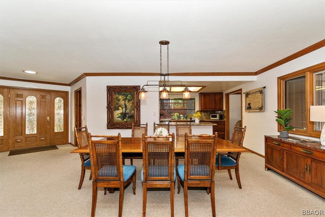 641 Golf Course Road Lake Arrowhead, CA 92352 - Photo 11 of 46 a dining room with furniture and window