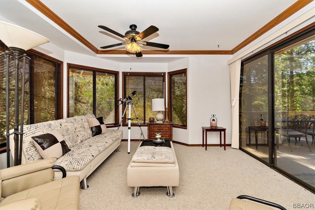 641 Golf Course Road Lake Arrowhead, CA 92352 - Photo 17 of 46 a living room with furniture and large windows