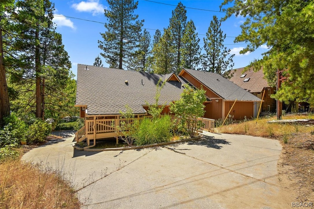 641 Golf Course Road Lake Arrowhead, CA 92352 - Photo 41 of 46 a view of a house with backyard and sitting area