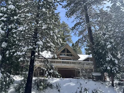 a front view of a house with yard