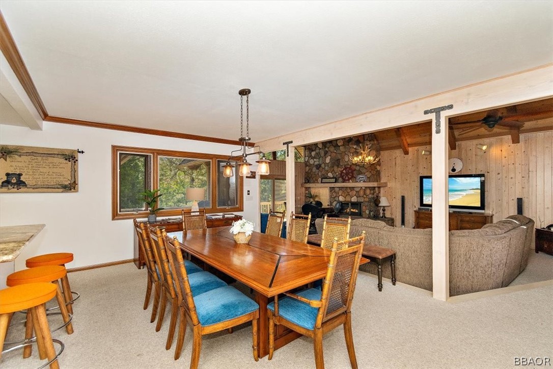 641 Golf Course Road Lake Arrowhead, CA 92352 - Photo 10 of 46 a dining room with furniture and window