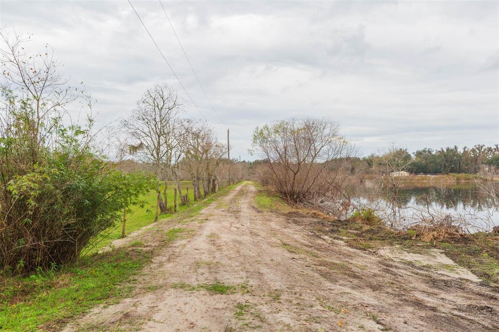 12628 Fort King Road Dade City, FL 33525 - Photo 34 of 59 a view of a lake view with mountain view