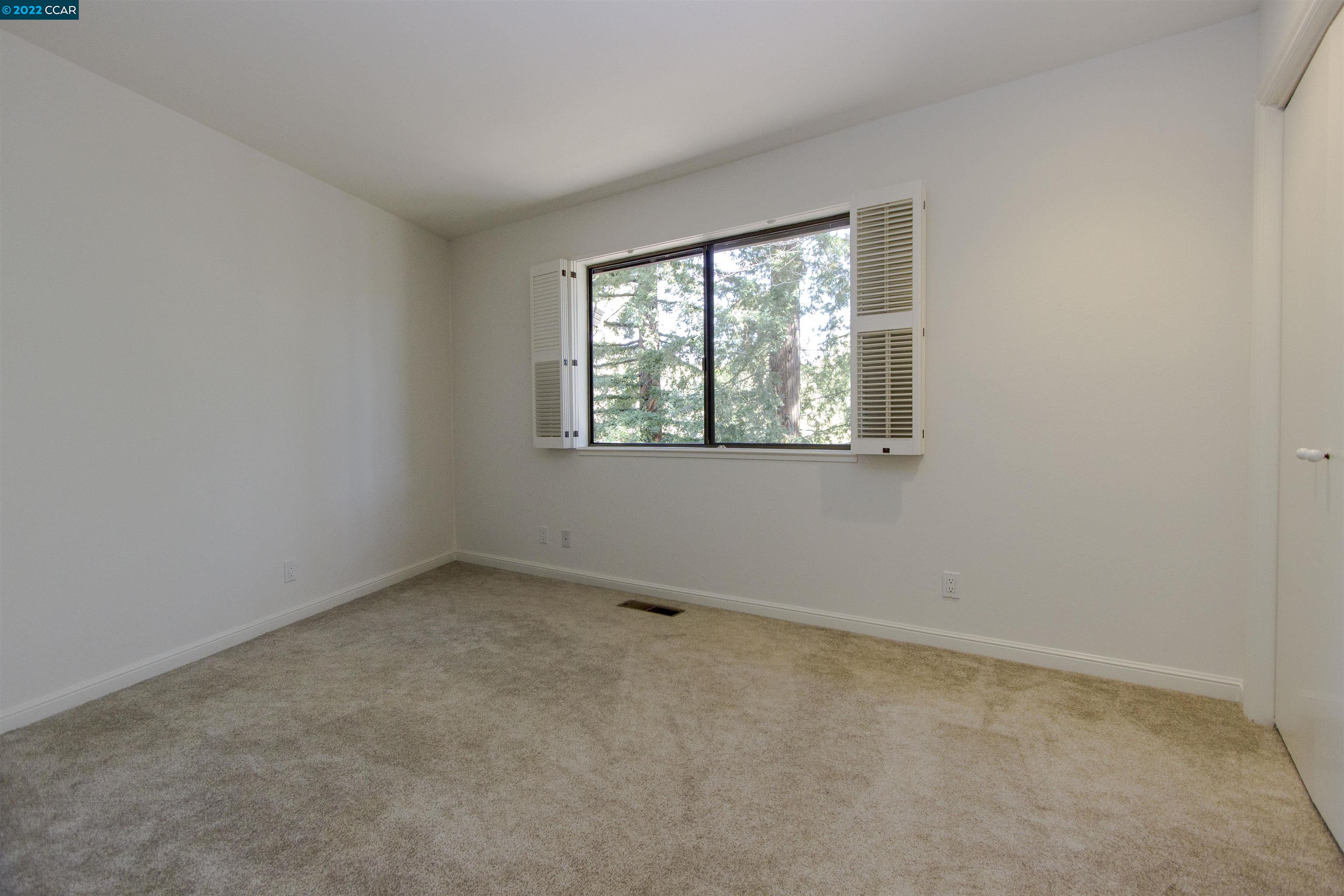 3399 Springhill Road Lafayette, CA 94549 - Photo 12 of 25 an empty room with a window