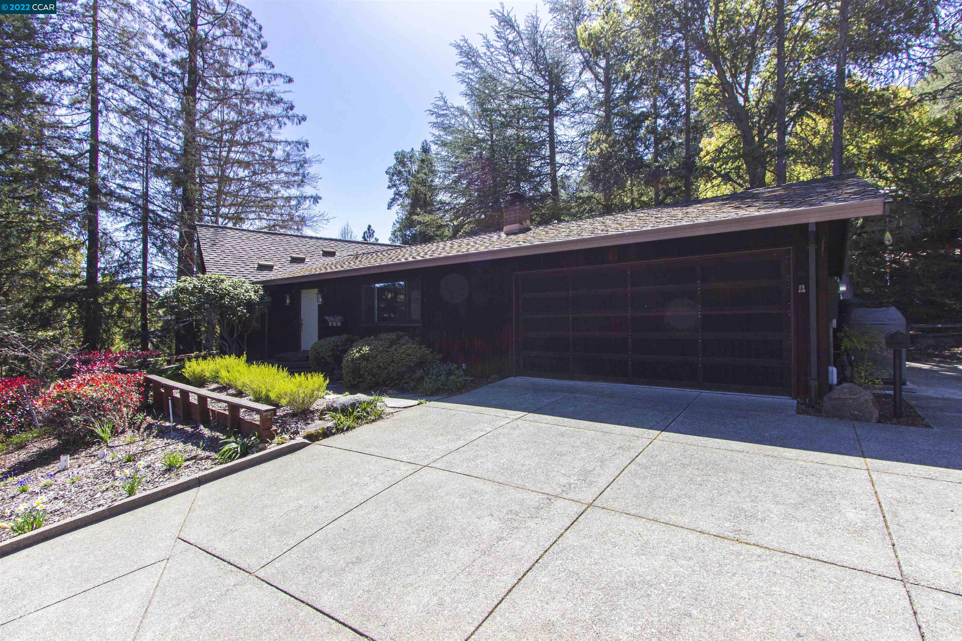 3399 Springhill Road Lafayette, CA 94549 - Photo 18 of 25 a front view of a house with entryway