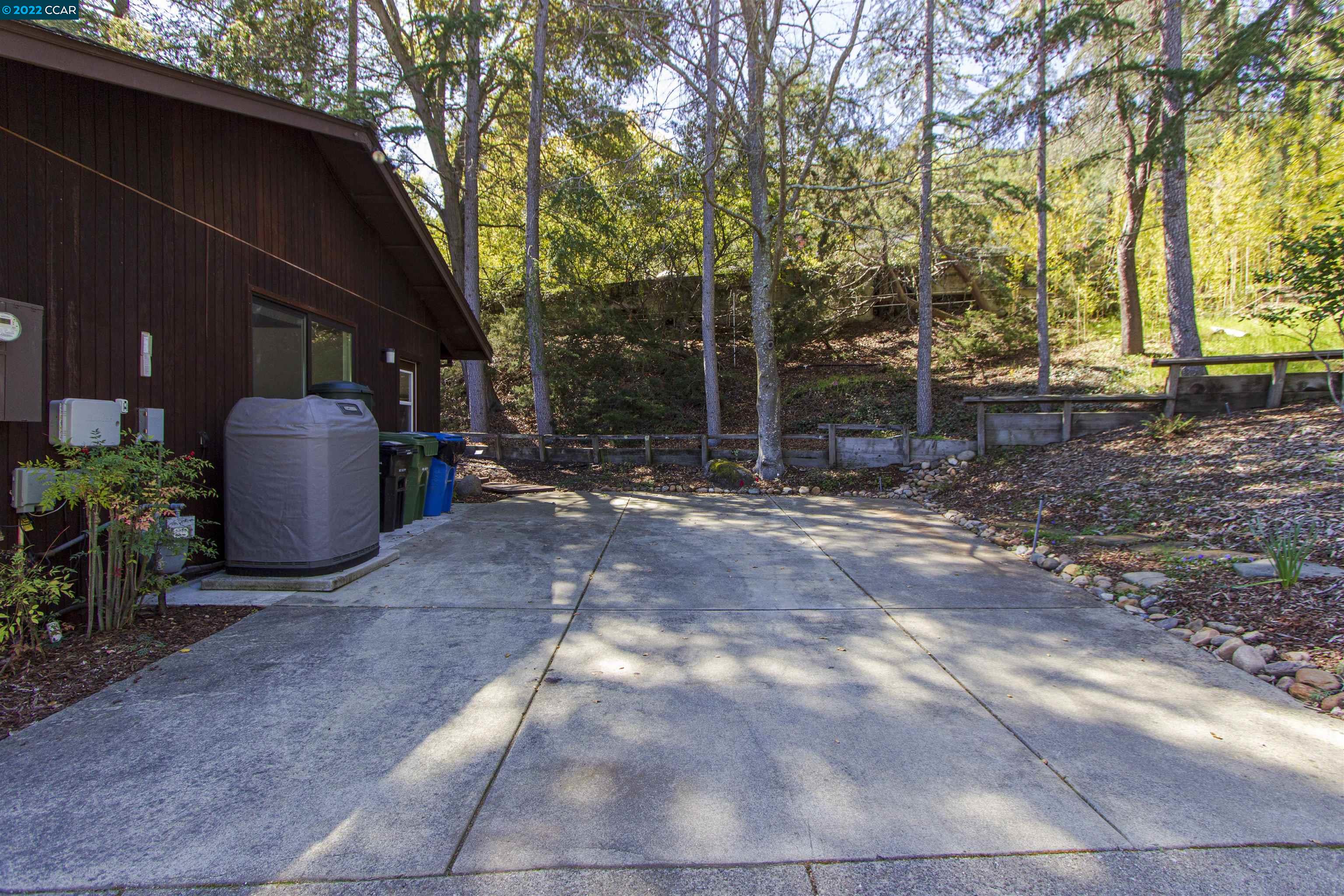 3399 Springhill Road Lafayette, CA 94549 - Photo 25 of 25 front view of a house with a trees