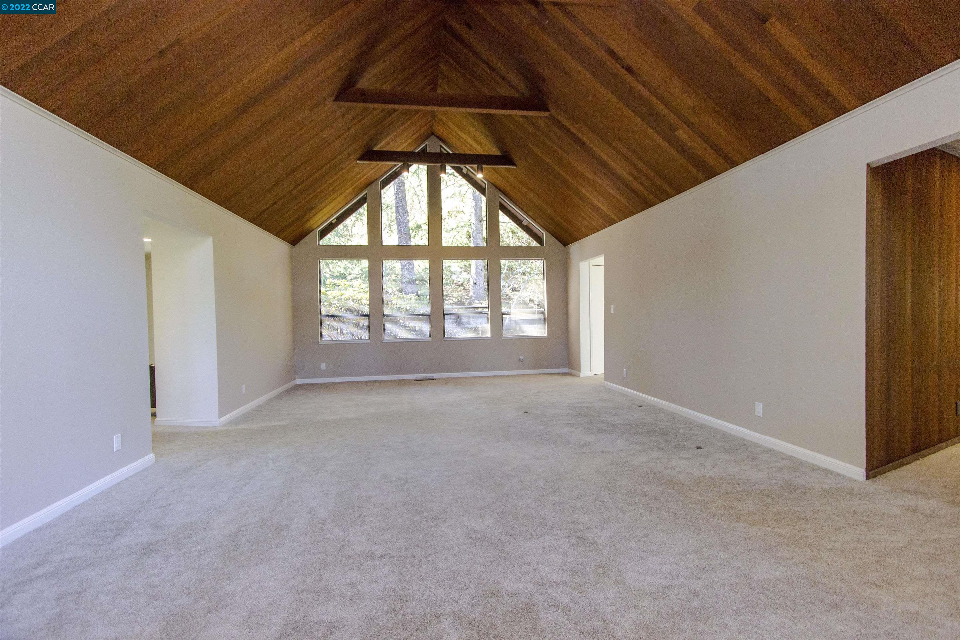 3399 Springhill Road Lafayette, CA 94549 - Photo 3 of 25 a view of an empty room with a window